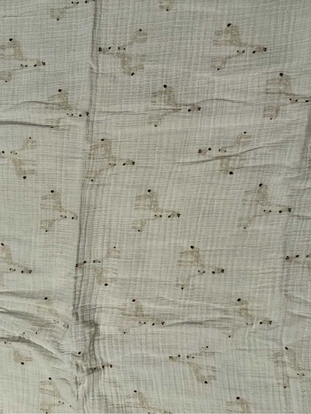 Aden white muslin swaddle blanket with giraffe print